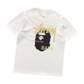 Camiseta Bape × Stussy "By A Bathing Ape"