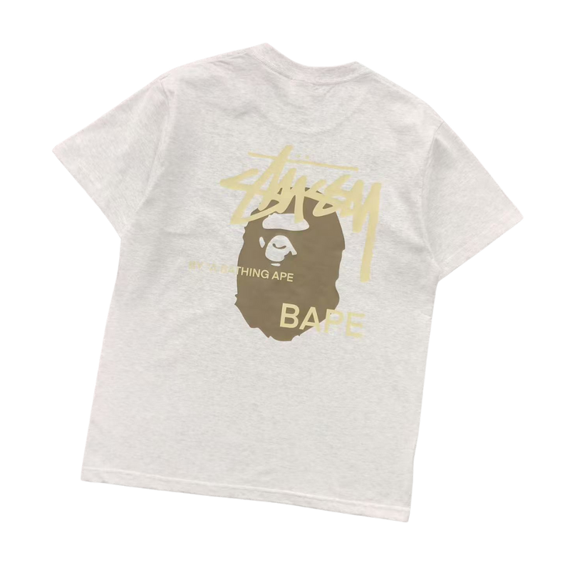 Camiseta Bape × Stussy "By A Bathing Ape"