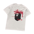 Camiseta Bape × Stussy "By A Bathing Ape"